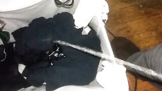 Pissing on dirty clothes